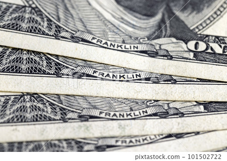 several American hundred dollar bills close-up 101502722