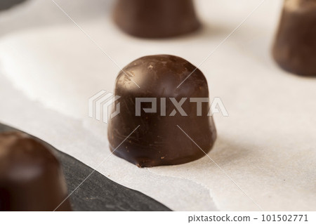 sweet chocolates with soft filling, chocolate pieces sweet chocolates with soft filling, chocolate pieces 101502771
