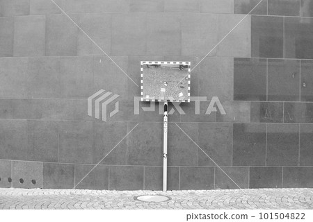 Grayscale of a street mirror in front of a massive brick wall, minimalistic brutalism in Duesseldorf, Germany Grayscale of a street mirror in front of a massive brick wall, minimalistic brutalism in Duesseldorf, Germany 101504822
