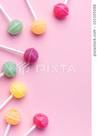 Sweet lollipops on pink background Sweet lollipops on pink background 101505088