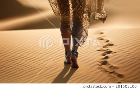 Beautiful women walking the desert during sunset, with bare feet and dress walking in the sand with morning sunlight,back view, oase beautiful landscape 101505106
