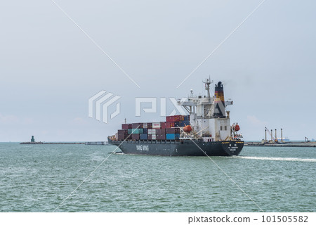 The container ship is leaving Kaohsiung Second Harbor, Taiwan. 101505582