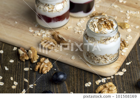 Fresh delicious yogurt made from milk with walnuts 101508169