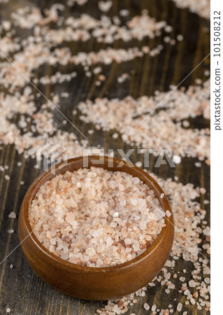 Pink natural salt on the table, close up 101508212