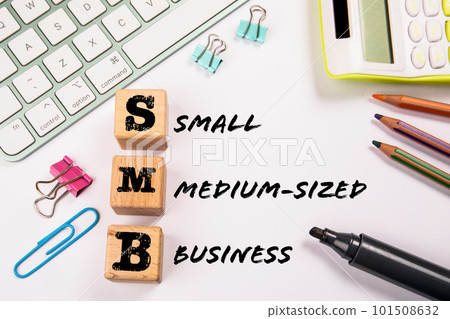 SMB - Small and Medium-Sized Business. Wooden blocks on a white office table 101508632