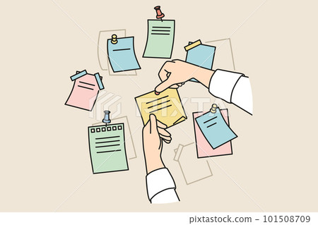 Person attach sticky notes to board Person attach sticky notes to board 101508709
