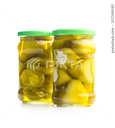 Peppers stuffed with cream cheese in jar isolated on white background. Peppers stuffed with cream cheese in jar isolated on white background. 101509595