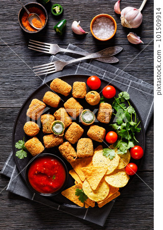 breaded crispy fried jalapeno poppers, top view 101509914