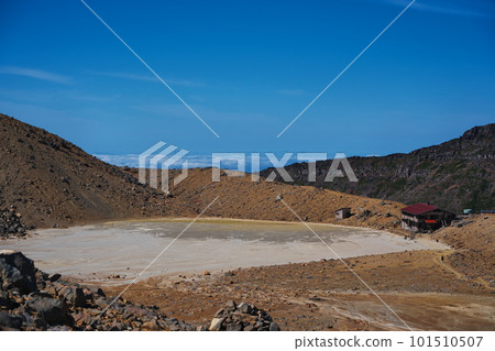 Looking towards Ninoike from near the 9th station of the Kurosawa Ascending Route to Mt. Ontake Kengamine in the autumn sky 101510507