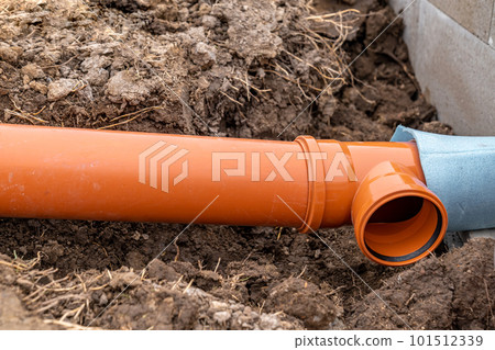 plastic pvc waste sewer pipe in the ground. construction site 101512339