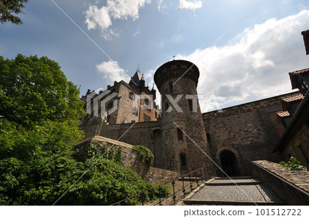 Low angle view of towers and the castle of Wernigerode in Germany Low angle view of towers and the castle of Wernigerode in Germany 101512722
