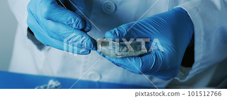 dentist adjusts an occlusal splint, banner format 101512766