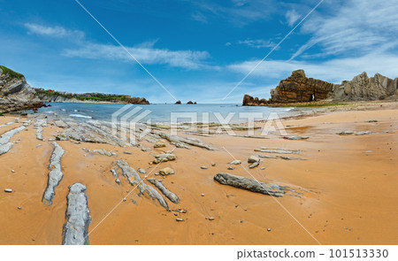 Beautiful sandy Playa Del Portio (Biskaya, Cantabria, Spain) summer landscape. Atlantic Ocean coastline view with rock formations. Beautiful sandy Playa Del Portio (Biskaya, Cantabria, Spain) summer landscape. Atlantic Ocean coastline view with rock formations. 101513330