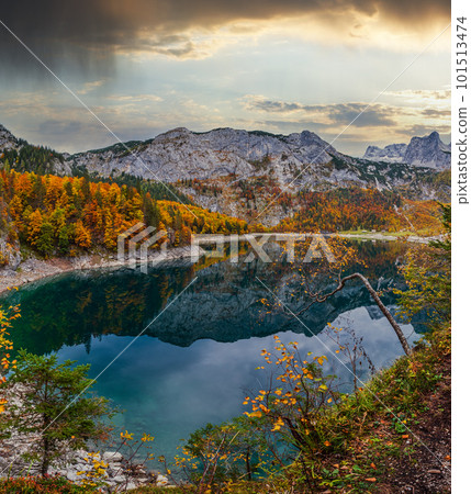 Picturesque Hinterer Gosausee lake, Upper Austria. Autumn Alps mountain lake with reflections. Dachstein summit and glacier in far. 101513474