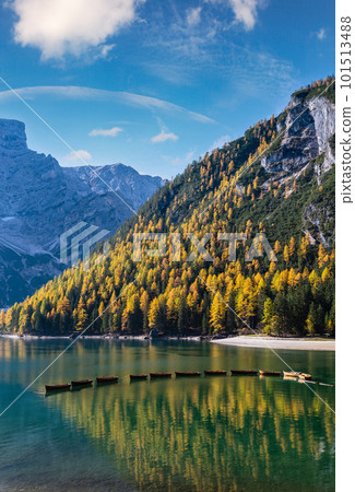 Autumn peaceful alpine lake Braies or Pragser Wildsee. Fanes-Sennes-Prags national park, South Tyrol, Dolomites Alps, Italy, Europe. Picturesque traveling, seasonal and nature beauty concept scene. Autumn peaceful alpine lake Braies or Pragser Wildsee. Fanes-Sennes-Prags national park, South Tyrol, Dolomites Alps, Italy, Europe. Picturesque traveling, seasonal and nature beauty concept scene. 101513488