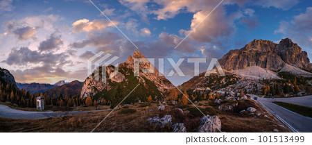 Early morning autumn alpine Dolomites mountain scene. Falzarego Pass, Italy 101513499