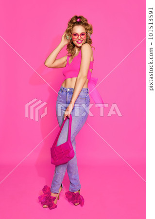 Portrait of stunning, young, beautyful woman wearing like sweet doll over pink studio background. Lady in pink sunlasses Portrait of stunning, young, beautyful woman wearing like sweet doll over pink studio background. Lady in pink sunlasses 101513591