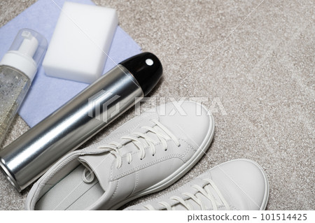 White leather shoe cleaning kit - water-repellent spray, foam, rag and sponge, copy space, place for text White leather shoe cleaning kit - water-repellent spray, foam, rag and sponge, copy space, place for text 101514425