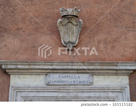 Marble board above the entrance of the Madonnella di San Marco, a small late 17th century devotional chapel part of Palazzo Venezia in Rome, Italy Marble board above the entrance of the Madonnella di San Marco, a small late 17th century devotional chapel part of Palazzo Venezia in Rome, Italy 101515182