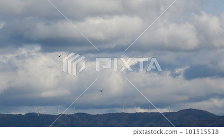 Cloudy evening sky and wind turbines standing on mountain ridges, spring, telephoto, mainly sky, 230318pm 101515518
