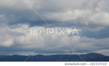 Cloudy evening sky and wind turbines standing on mountain ridges, spring, telephoto, mainly sky, 230318pm 101515519