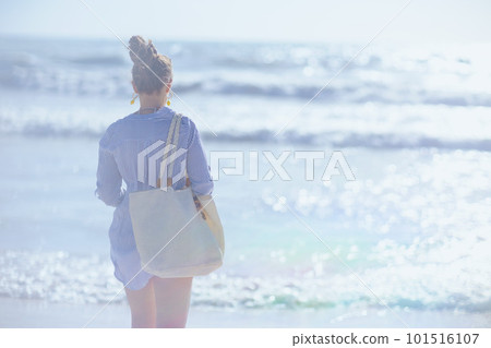 Seen from behind female at beach 101516107