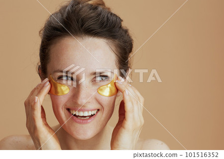 happy modern woman with eye patches 101516352