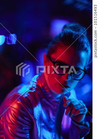 pensive trendy business woman in glasses 101516493