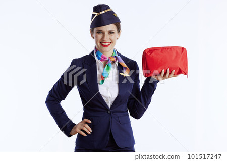 happy elegant air hostess woman on white 101517247