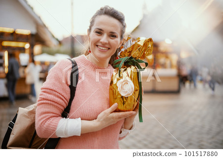 young 40 years old woman in pink blouse at fair in city 101517880
