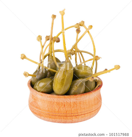 Capers isolated on white background. Pickled capers. Canned capers. Capers isolated on white background. Pickled capers. Canned capers. 101517988