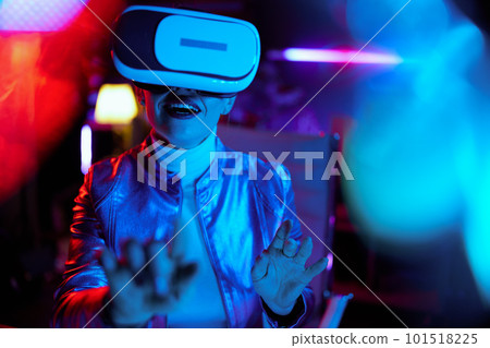 happy stylish female in virtual reality goggles happy stylish female in virtual reality goggles 101518225
