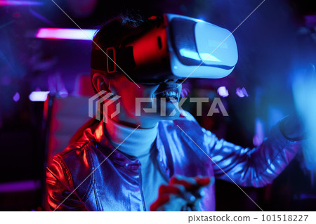 happy stylish woman exploring digital cyber world in office 101518227