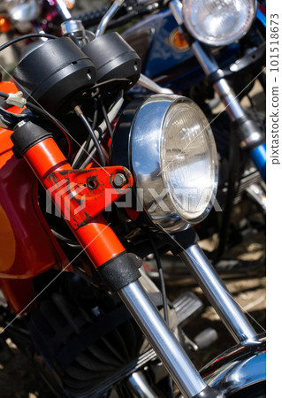 Retro motorcycles parked on the street Retro motorcycles parked on the street 101518673