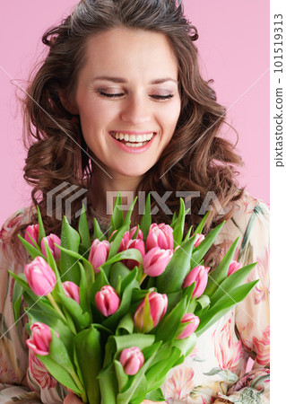 happy elegant woman in floral dress on pink happy elegant woman in floral dress on pink 101519313