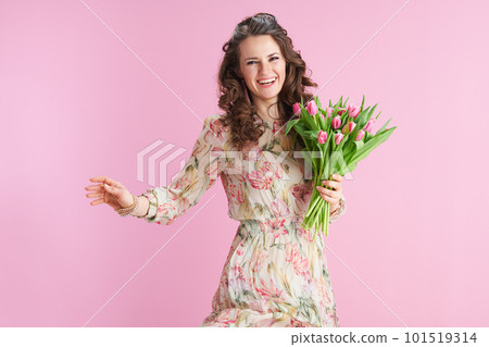 happy elegant woman with long wavy brunette hair on pink happy elegant woman with long wavy brunette hair on pink 101519314