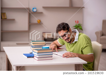 Young male student studying at home Young male student studying at home 101519630