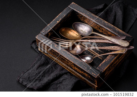 Vintage rectangular shabby wooden box with spoons and forks 101519832