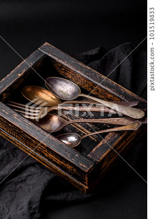 Vintage rectangular shabby wooden box with spoons and forks 101519833
