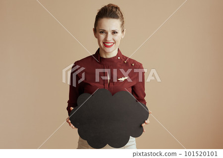 smiling elegant female stewardess isolated on beige background smiling elegant female stewardess isolated on beige background 101520101