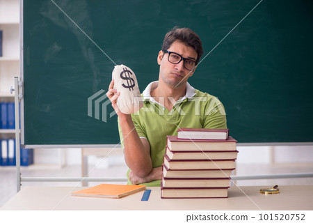 Young male student in expensive education concept 101520752