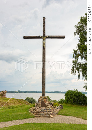 Wooden cross with Jesus on it. Near catholic church in Ludza, Latvia. 101520854