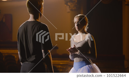 Ballet dancers warm up and prepare for performance 101522664