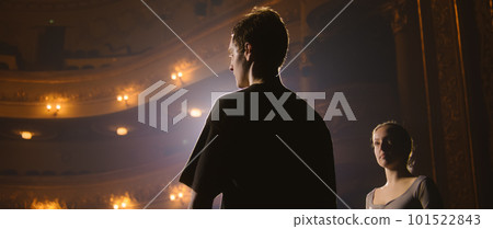 Ballet dancers perform ballet movements on theater stage Ballet dancers perform ballet movements on theater stage 101522843