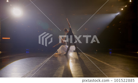 Ballet dancers practice ballet movements 101522885