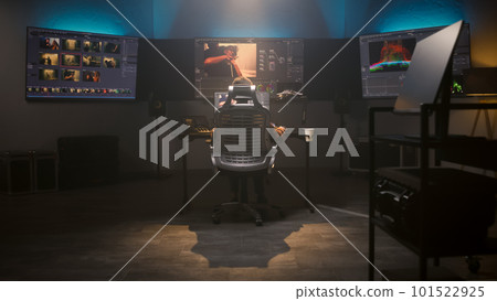 The editor makes movie color correction in studio The editor makes movie color correction in studio 101522925