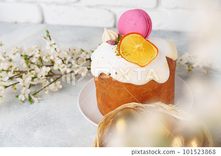 Easter cake and golden eggs on table Easter cake and golden eggs on table 101523868