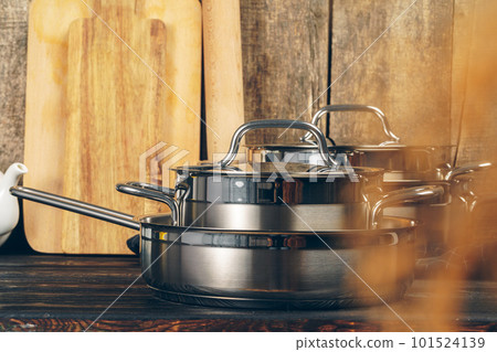 Set of dishware against old wooden background Set of dishware against old wooden background 101524139