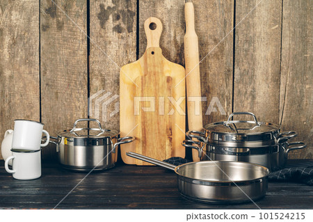 Set of dishware against old wooden background Set of dishware against old wooden background 101524215