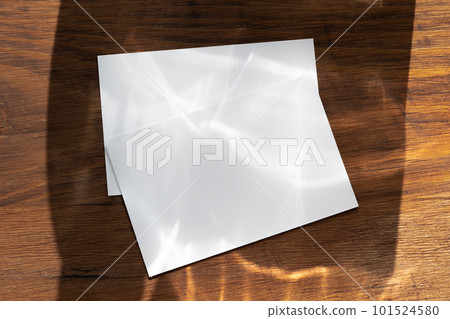 Blank white business cards on wooden background. 101524580